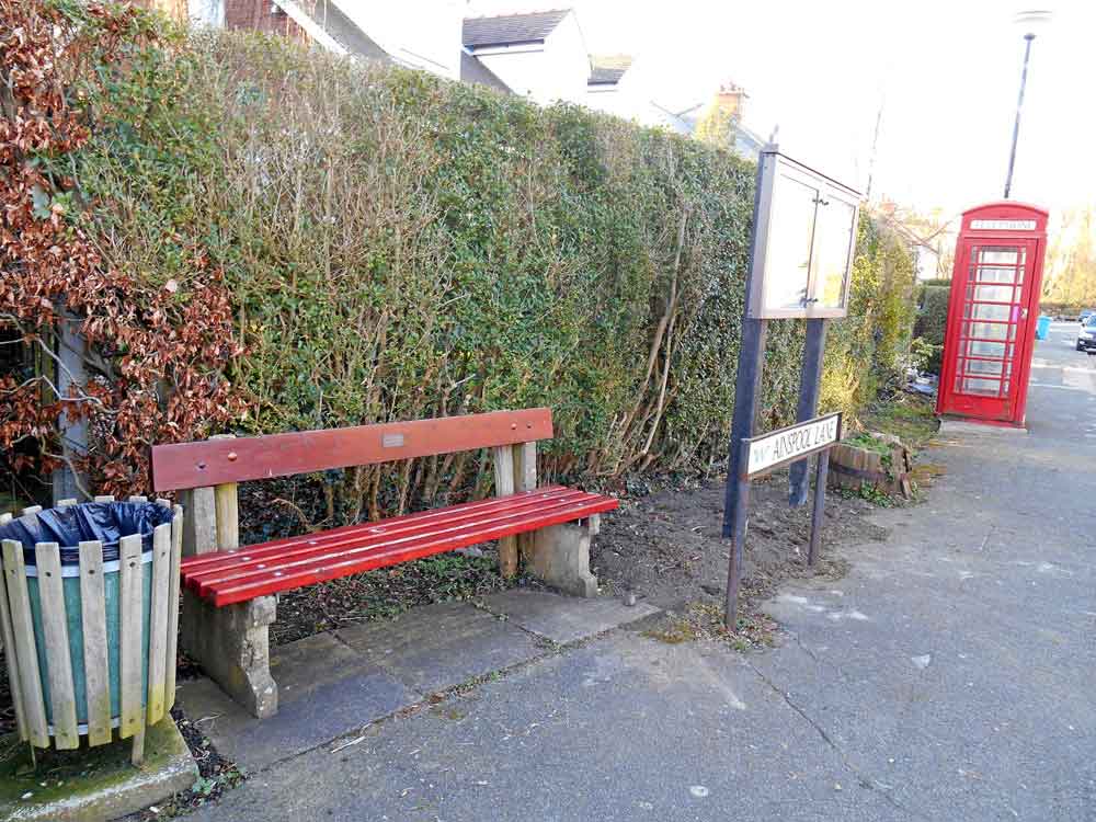 Parish public seats located at the cross